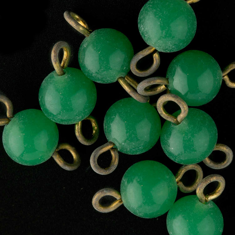 Japanese jade green glass bead connector. bead size is 5mm. pkg of 10.