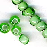 Czech green whitehearts. 3x4mm. 12 gr Bag. Approx 150 beads.