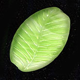 Vintage pressed glass leaf bead. 15x10mm. Pkg of 4