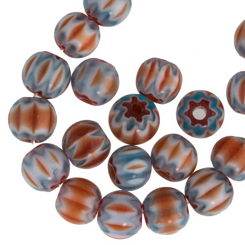 Contemporary turquoise and coral chevrons. 6mm. Strand of 75.
