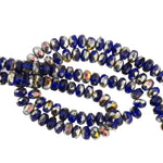 Mixed strand of faceted blue, silvered and AB rondelles 2x4mm. 5.5 inch strand of 50 beads.