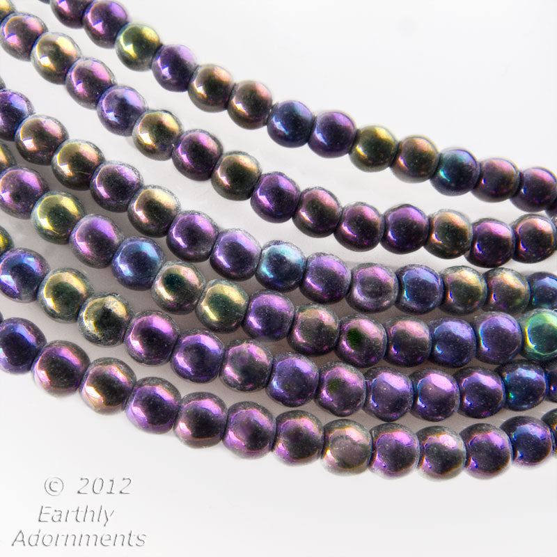 Purple iris 3mm smooth rounds, strand of 100. 1 strand of 100.
