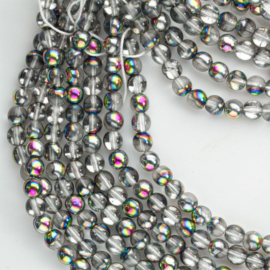 Contemporary Czech clear glass beads with a 1/2 vitrail finish.6mm,12" strand, or 50 beads b11-mi-2054