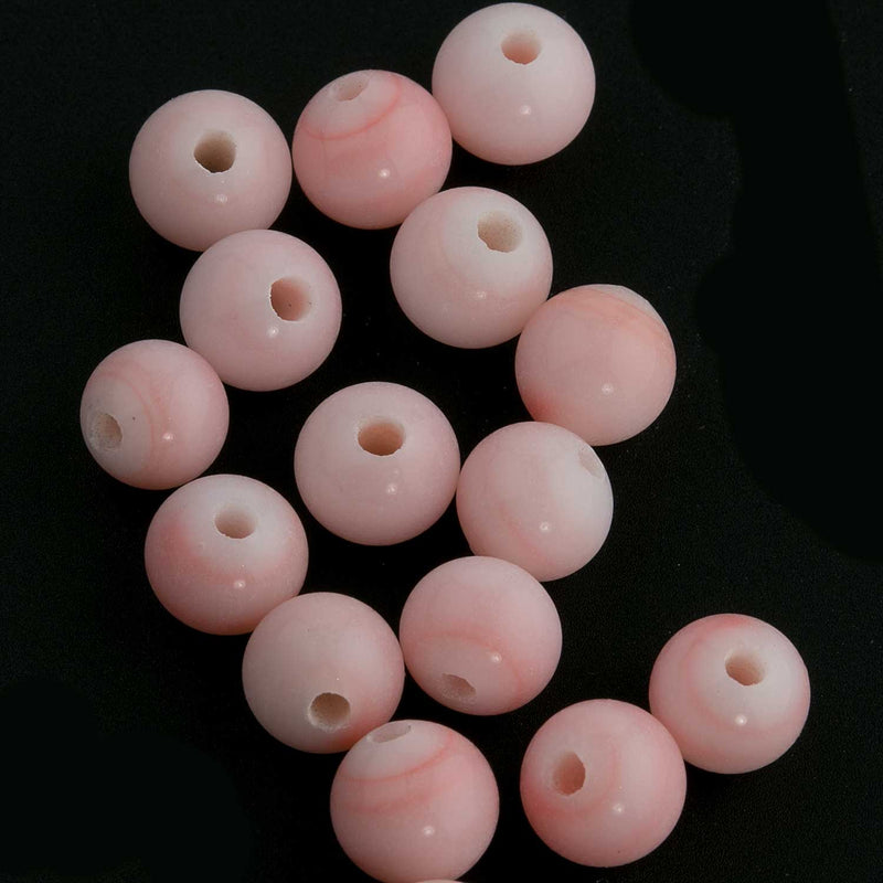 Vintage Cherry Brand angel skin coral pink rounds. 6mm. Pkg of 10.