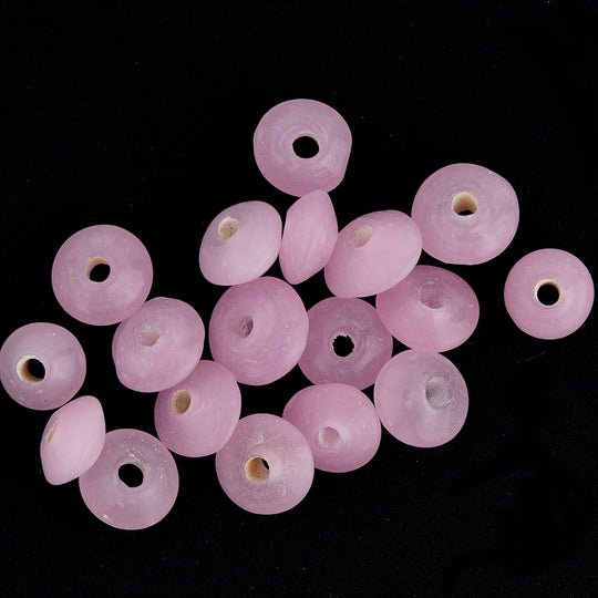 Vintage lemonade pink translucent flattened bicones, Japan. 4x7mm. Pkg of 25. b11-pp-0872(e)