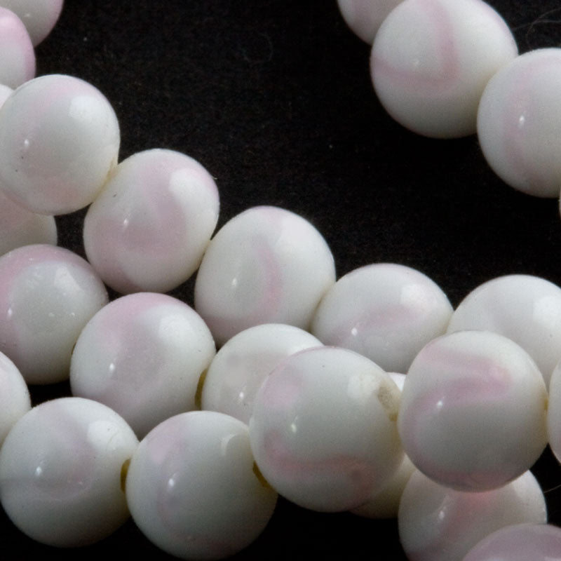 Vintage Japanese opal white round with rose pink swirls. 7mm Pkg of 25. 