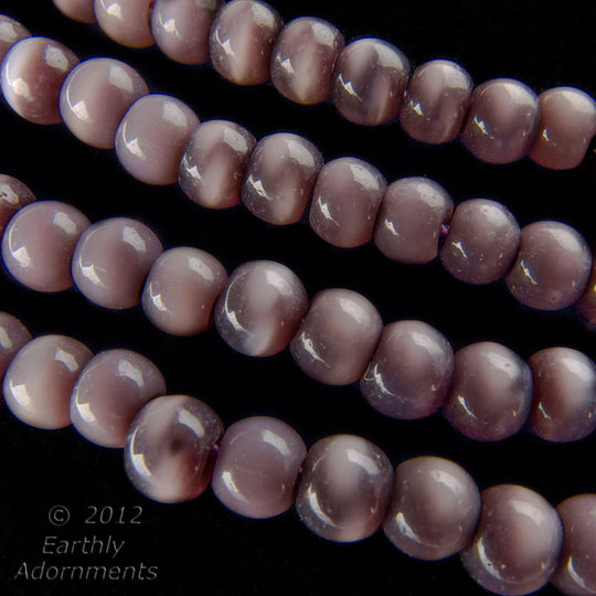 Vintage cats eye beads 4mm in a dark purple. 16 inch strand. b11-pp-1187(e)