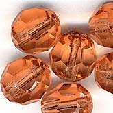 Vintage German faceted peach rounds. 9mm. Pkg of 10