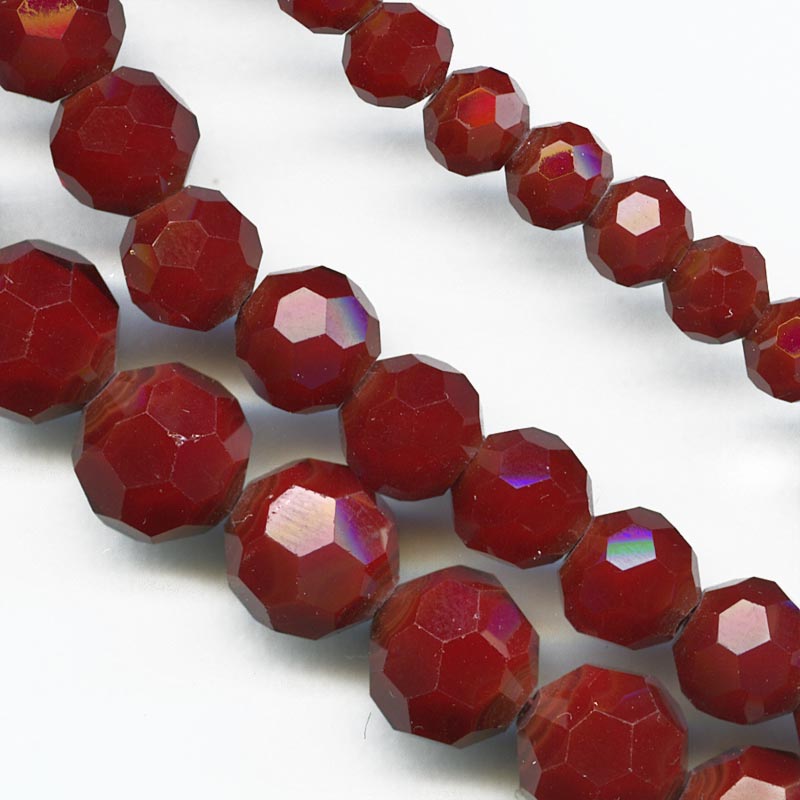 Opaque machine cut ruby crystal beads, 5x6mm, 11-inch strand of 48-50 beads.