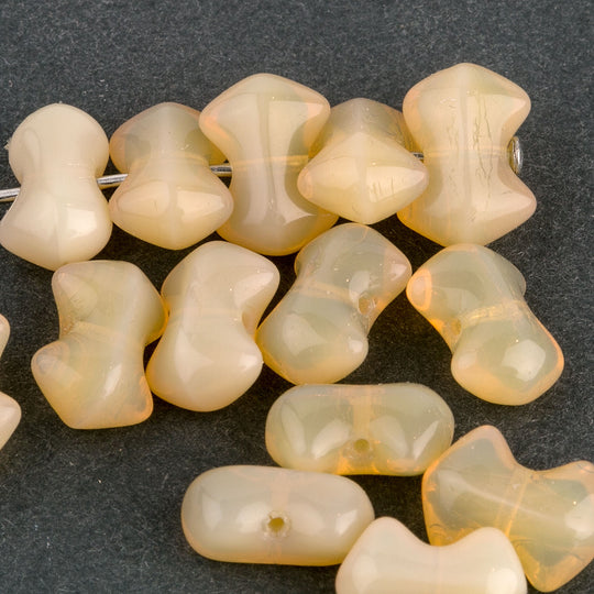 Vintage opalescent interlocking bowtie beads 10mm. Strand of 25 beads. B11-YO-0330(e)