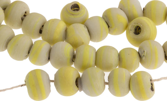 b11-yo-0767 Vintage Czech flattened sandcast white and yellow rounds. 8 x 10 mm to 12 x 14 mm.  Pkg of 8.