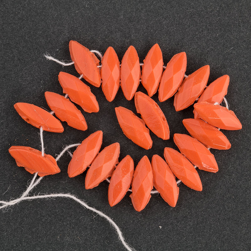 Antique opaque two hole marquise beads. 5x12mm. Pkg of 23.
