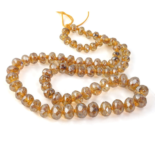Graduated knotted strand gemstone-cut citrine luster glass bead strand.16 in. strand.  b11-yo-0878