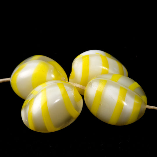 West German givre style triangular nuggets.11x14mm. Pkg of 4-b11-yo-0883