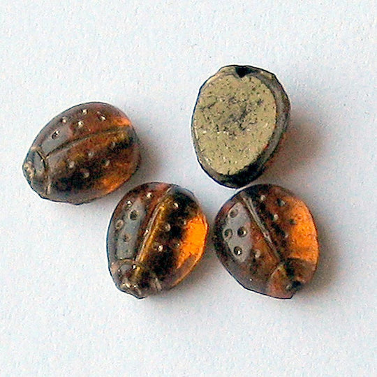 Old Bohemian foiled amber flat back molded ladybug beads verticle hole 9x6mm pkg of 4. b11-yo-0929(e)