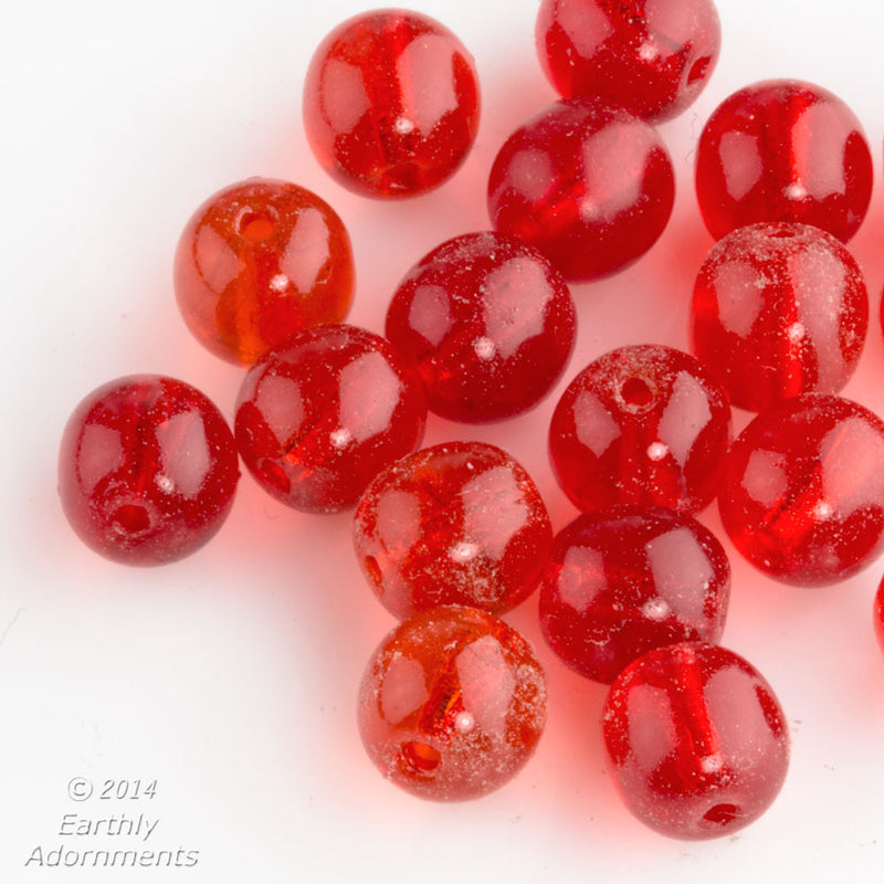 Vintage red-orange translucent 7mm druk beads. Package of 10. 