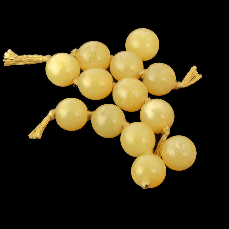 Yellow translucent,  Antique Peking Glass beads. 10mm Pkg 4.