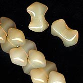 Vintage opalescent interlocking bowtie beads 10mm. Strand of 25 beads.
