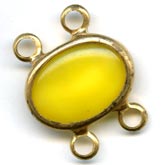 Yellow glass moonstone in raw brass setting. 18x13mm. Pkg of 1