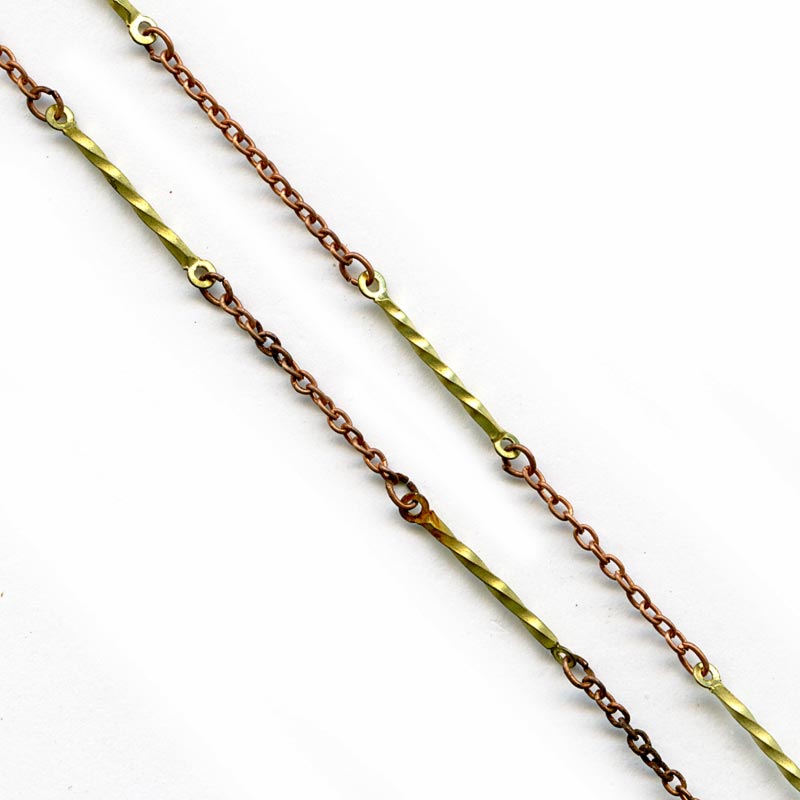 Vintage copper over steel 2 mm cable chain with brass twist links. Sold by the foot.
