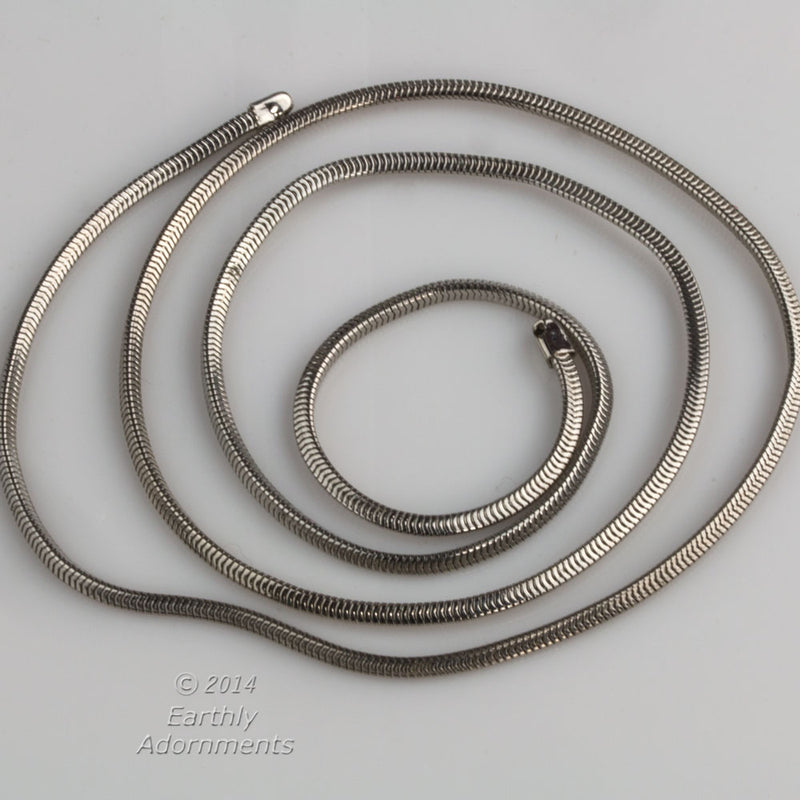 Vintage silver metal finished snake chain. 2mm width. Sold in 24" lengths.