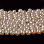 AA quality freshwater pearls, loose, off-round light apricot. 4mm. Pkg 50. 1990s.