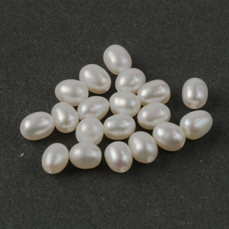 A quality freshwater pearls, 5x4mm ovals. Vintage 1990s. Pkg. 40.