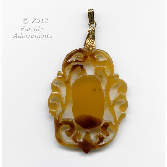 Vintage hand carved translucent horn pendant. 49x34mm. b3-ho32