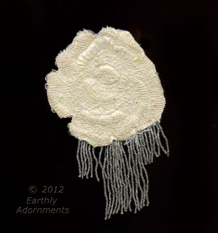 Vintage beaded appliqués with fringe. 3.5" x 3.5" with 2.5" long fringe.