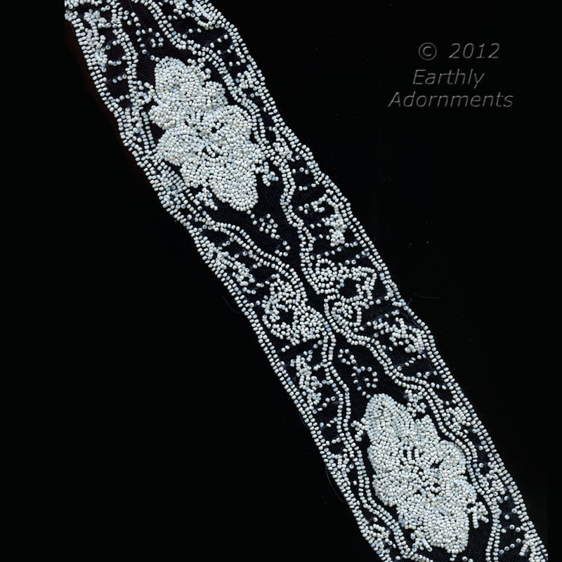 Fabulous beaded lace trim. White beads on black lace. 28'' long x 2.75" wide