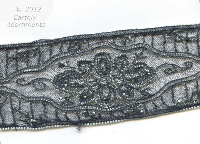 Fabulous beaded lace trim. White beads on black lace. 28'' long x 2.75" wide