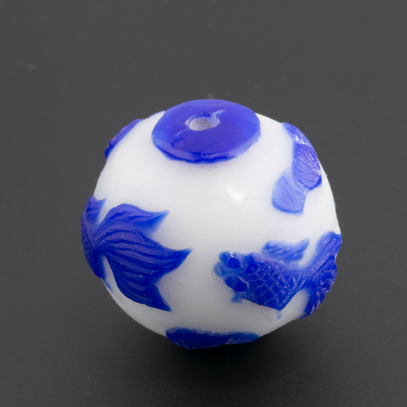 Hand carved bead cobalt blue goldfish on milk white glass round 28mm pkg of 1. 
