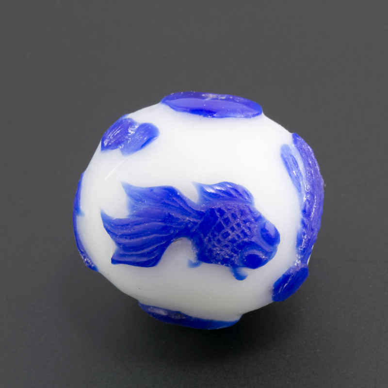 Hand carved bead cobalt blue goldfish on milk white glass round 28mm pkg of 1. 