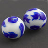 Hand carved bead cobalt blue goldfish on milk white glass round 28mm pkg of 1. 