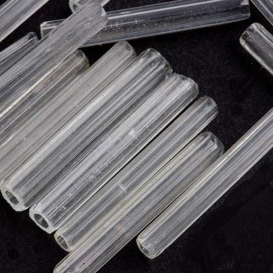 Vintage 1920's clear glass bugles. 22mm. 6.5 gram bag. b17-146(e)