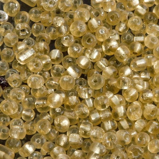 b17-151-Vintage 1930s Italian transparent golden charlottes with silver core size 11/0, 10 gram bag