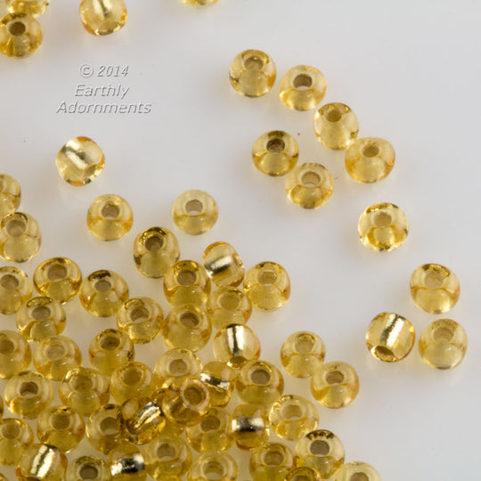 Vintage foiled lined golden charlottes. Size 8. 15 gram bag.