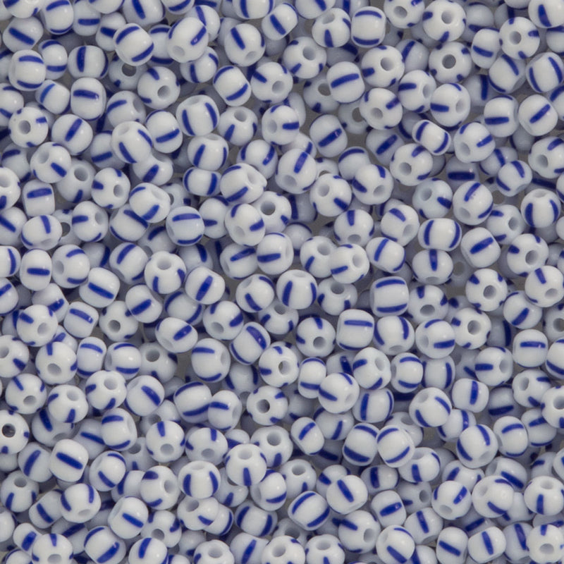 Vintage Italian white with blue stripe seed bead size 11/0. 15 gram bag.