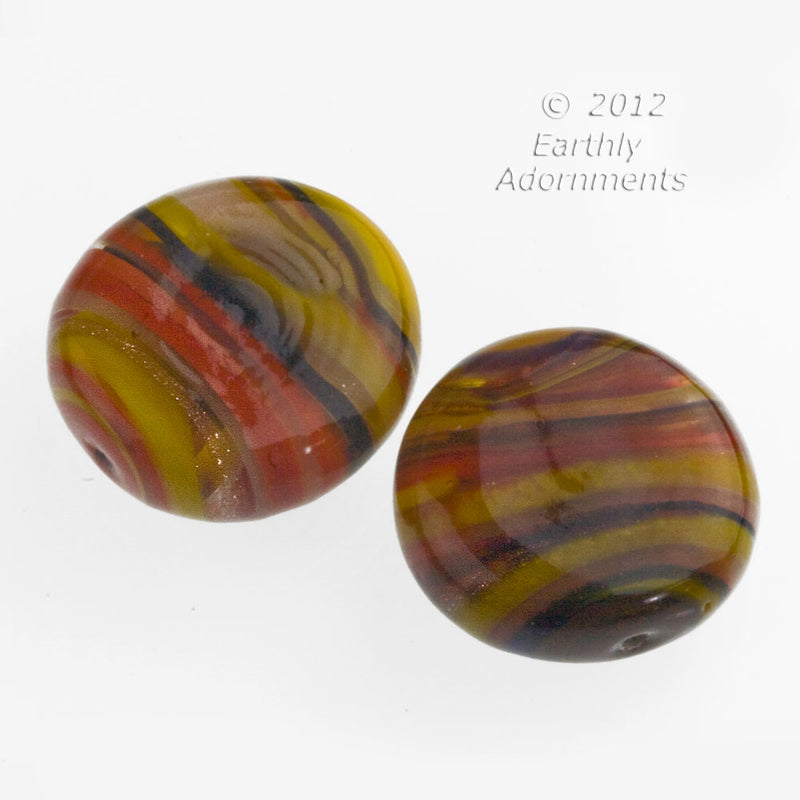 Contemporary lampwork disk made from old German and Italian glass canes.  26x10mm. Sold indv. Single Hole for Glue-In Peg.