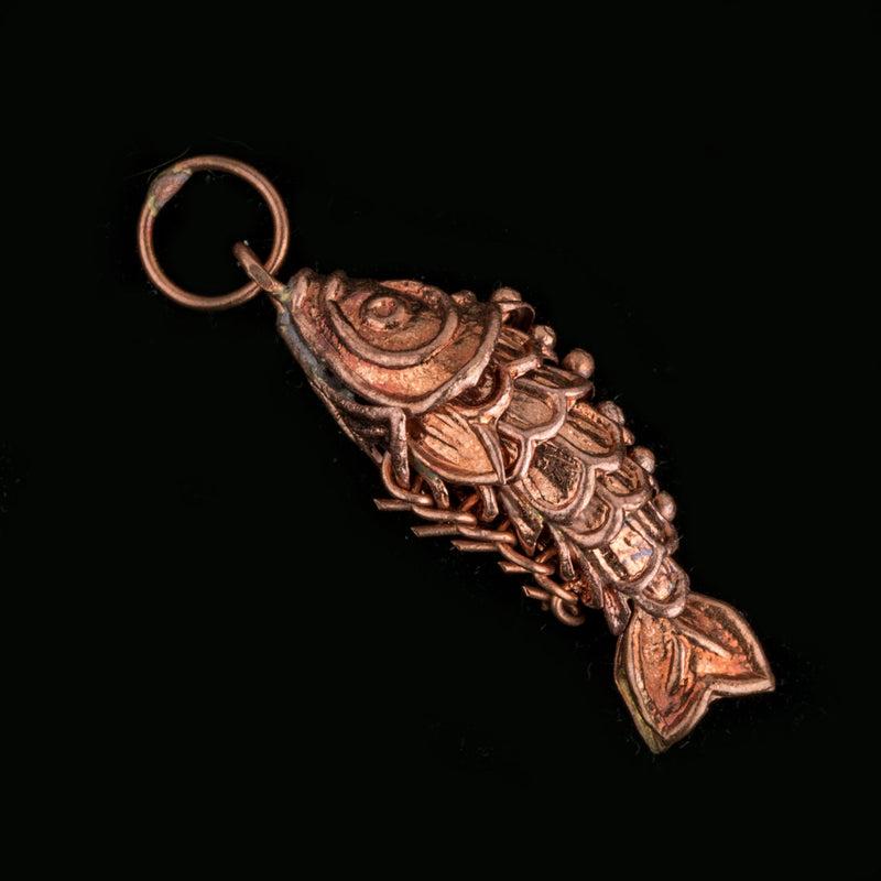 articulated copper fish pendant. 1". Pkg of 1