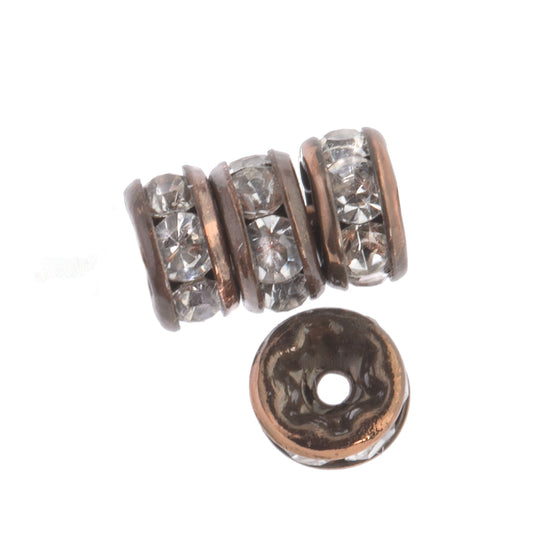 Clear rhinestone rondelle with antiqued copper. 6mm. Pkg of 4. b18-0270-2