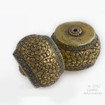 Handmade Vintage Tibetan heavy brass repoussé focal bead with crushed turquoise inlay 24x28mm. 