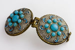 Silver on copper lacey filigree locket with turquoise glass