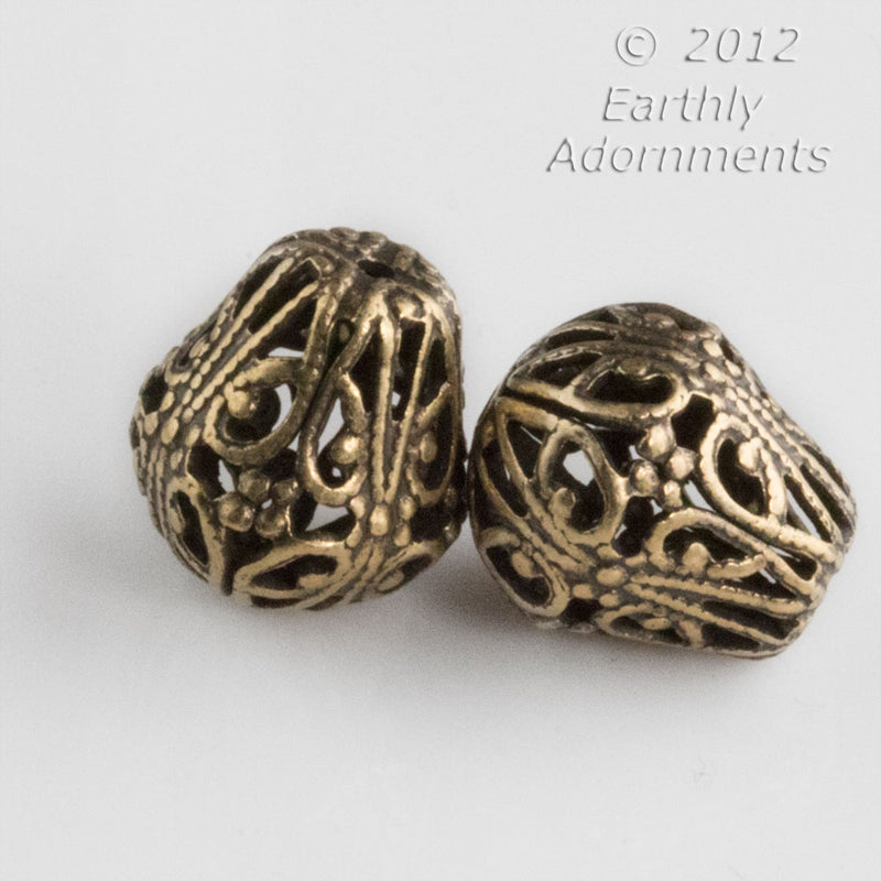 Oxidized brass pear shaped filigree bead. 16x9 mm. Pkg of 2