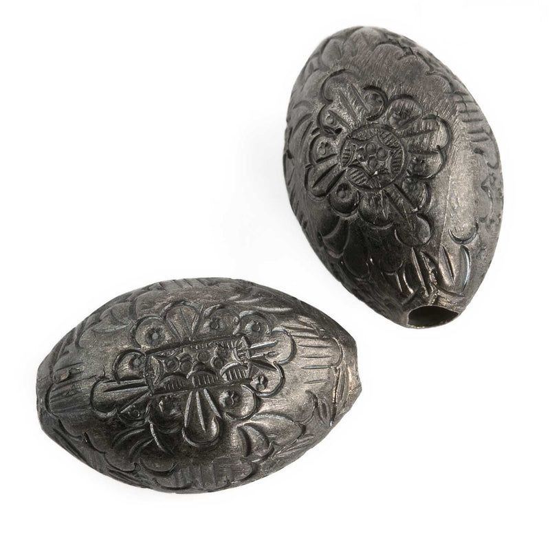 Vintage Silver plated hollow bead with chased floral design. Chinese export. 22x15mm. Sold individually.