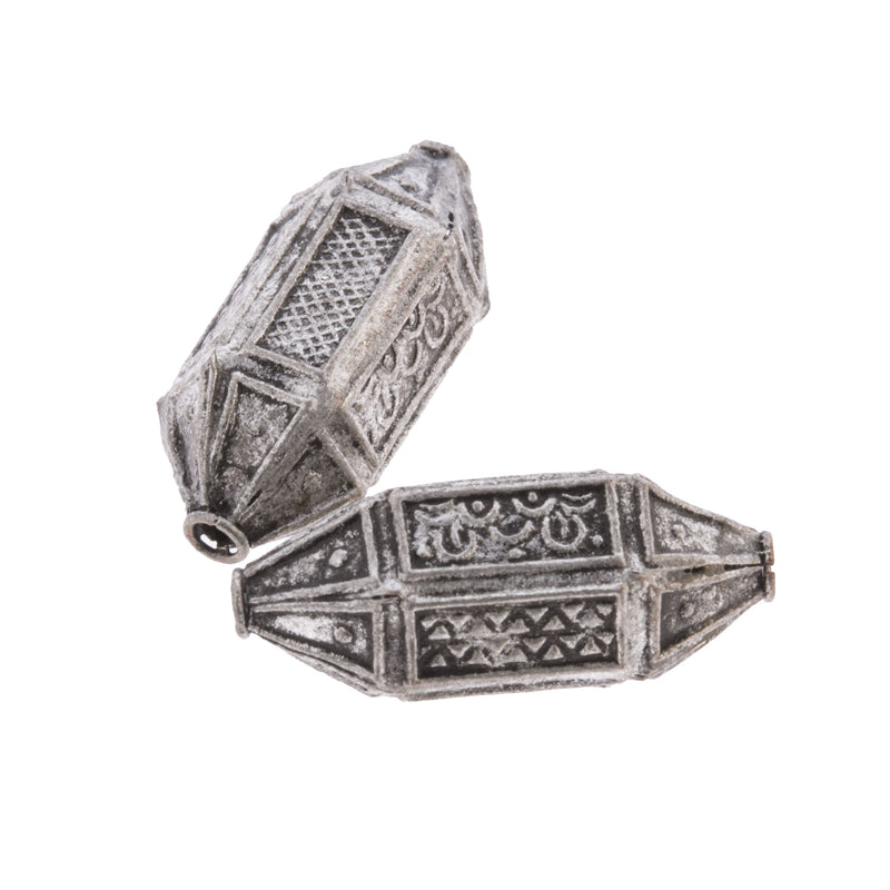 Lantern shaped silver over copper 6 sided panel bead.  26x10mm.  Pkg2.