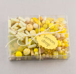 Vintage glass bead mix in an array of yellow colors from Europe, Japan and beyond.  5 oz box. Lemon Drop.