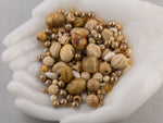 Vintage glass bead mix of caramel color beads from Europe, Japan and beyond.  5 oz box. Caramel Latte.