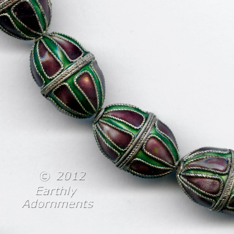 Enameled copper oval bead in green and purple with twisted silver wire. 16 x 12mm. Package of 1. 