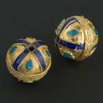 Gold plate and and blue enamel bead. 12mm. Sold individually. 